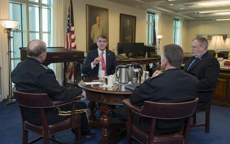 Incoming Defense Secretary Ash Carter hosts a "Big 4” round-table meeting with Deputy Defense Secretary Bob Work, Army Gen. Martin E. Dempsey, chairman of the Joint Chiefs of Staff, and Navy Adm. James A. Winnefeld Jr., vice chairman of the Joint Chiefs of Staff, at the Pentagon, Feb. 17, 2015, as Carter assumed his new duties. 