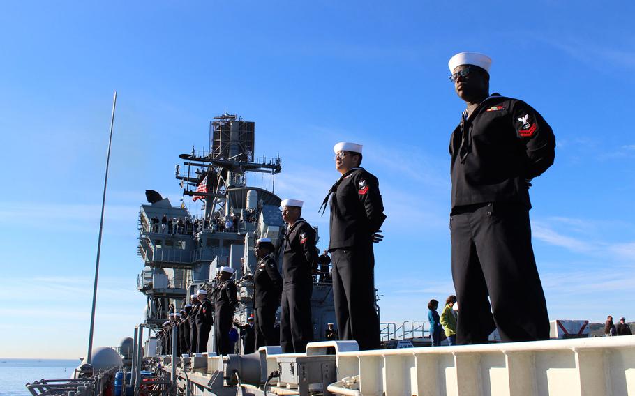 Sailors man the rails on the USS Makin Island as the Wasp-class amphibious assault ship makes its way into San Diego Bay on Wednesday morning. The ship was returning from a seven-month deployment during which the crew remained at sea for a 115-day stretch. 