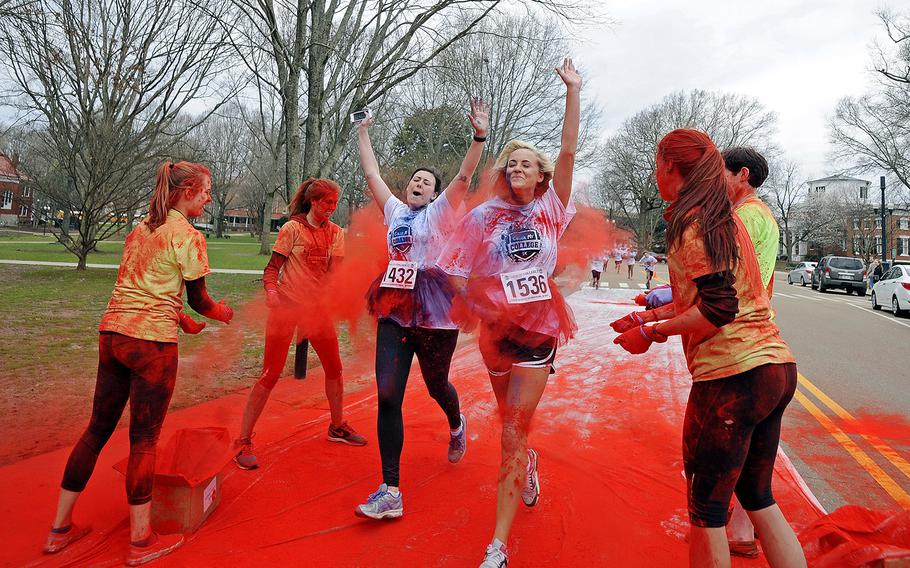 Participants run in a Color My Campus 5k Color Run in Oxford, Miss., on March 21, 2015.
