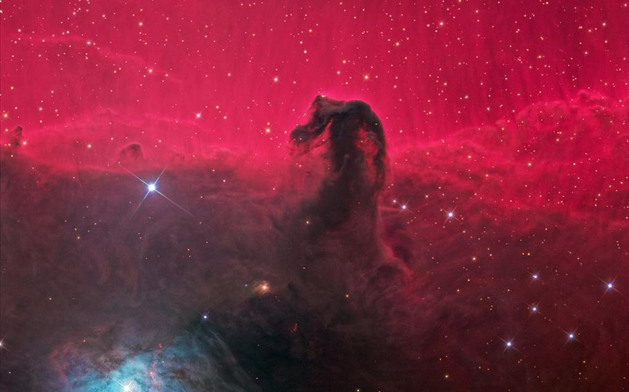 6TH PLACE | Horsehead Nebula (also known as Barnard 33 in emission nebula IC 434) is a dark nebula in the constellation Orion. The image is a frame mosaic taken with 5 different filters, standard Red – Green – Blue with details enhanced with narrowband data of Hydrogen-alpha (Hα) and O III. The Hα was color-mapped to red and the O III to teal. So it is a representative color image consisting of over 900 minutes of exposure time. Ken Crawford (CC BY-SA 3.0) [<a href="http://commons.wikimedia.org/wiki/Commons:Picture_of_the_Year/2014/Results#/media/File:Barnard_33.jpg" target=_blank>Original image</a>]