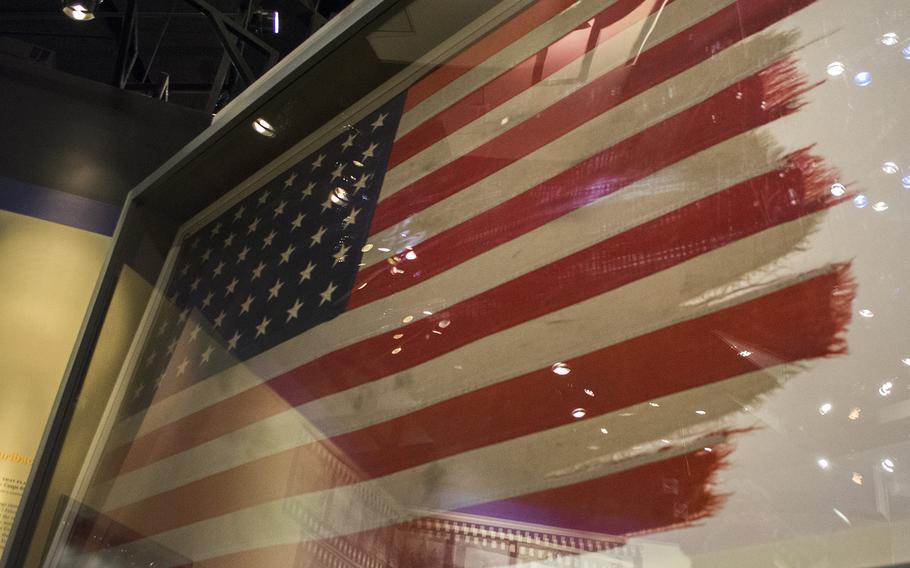 The flag raised on Iwo Jima that was made famous by the Associated Press photographer Joe Rosenthal inside the National Museum of the Marine Corps in Triangle, Va., on Feb. 19, 2015.