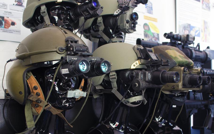 Old helmets are on display to show how technology changed throughout the years at the first DoD Lab Day at the Pentagon on May 14, 2015.