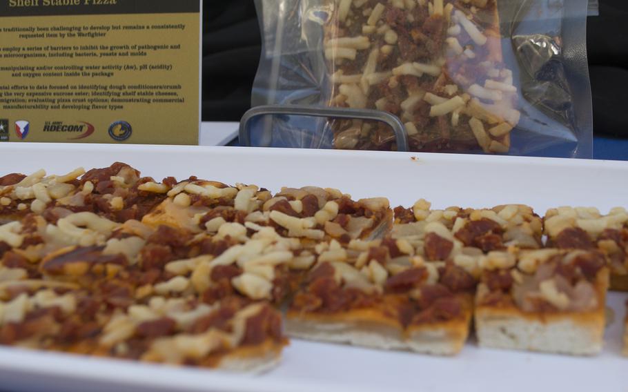 Pizza MRE's - set to be available in 2017 - are on display at the first DoD Lab Day at the Pentagon on May 14, 2015.