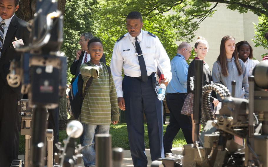 Robotic machine guns from the Marine Corps Warfighting Lab are on display at DOD Lab Day at the Pentagon on May 14, 2015.