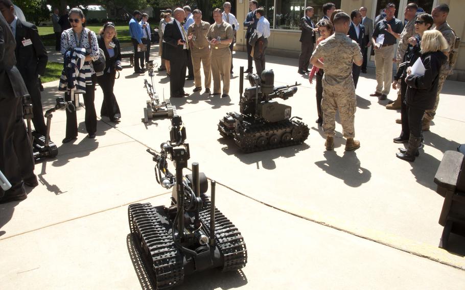 Robotic machine guns from the Marine Corps Warfighting Lab are on display at DOD Lab Day at the Pentagon on May 14, 2015.
