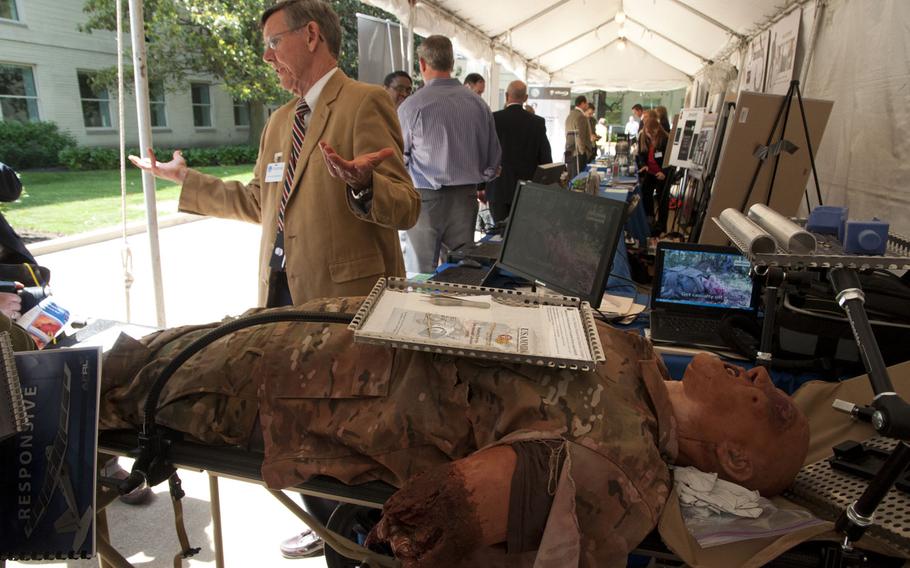 J. Harvey Magee of the Armed Forces simulation Institute for Medicine shows off a realistic mannequin capable of bleeding at DoD Lab Day at the Pentagon on May 14, 2015. The mannequin is meant to train deploying troops in combat surgery skills without the use of animals or cadavers.