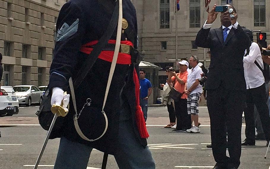 Reenactors march by in Washington, D.C., on Sunday, May 17, 2015, as part of the Grand Review Parade celebrating its 150 year anniversary.