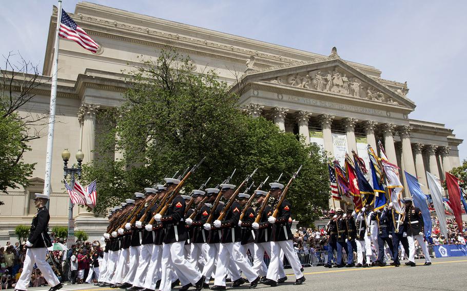 The 2014 National Memorial Day Parade passes the National Archives in Washington, D.C.