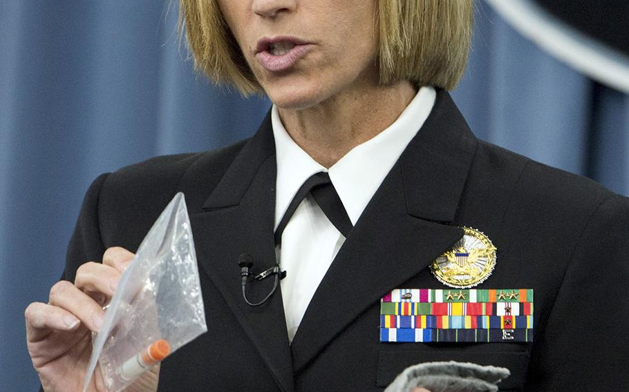 Director of Medical Programs for DOD Chemical and Biological Defense Cmdr. Franca Jones, explains how anthrax samples are shipped during a press briefing on the DOD Lab Review and Anthrax shipment investigation, June 3, 2015.