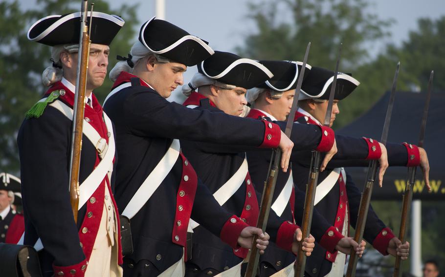 Re-enactors perform at Joint Base Myer-Henderson Hall in Arlington, Va., on June 10, 2015, as part of the Twilight Tattoo.