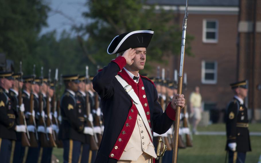 Re-enactors perform at Joint Base Myer-Henderson Hall in Arlington, Va., on June 10, 2015, as part of the Twilight Tattoo.