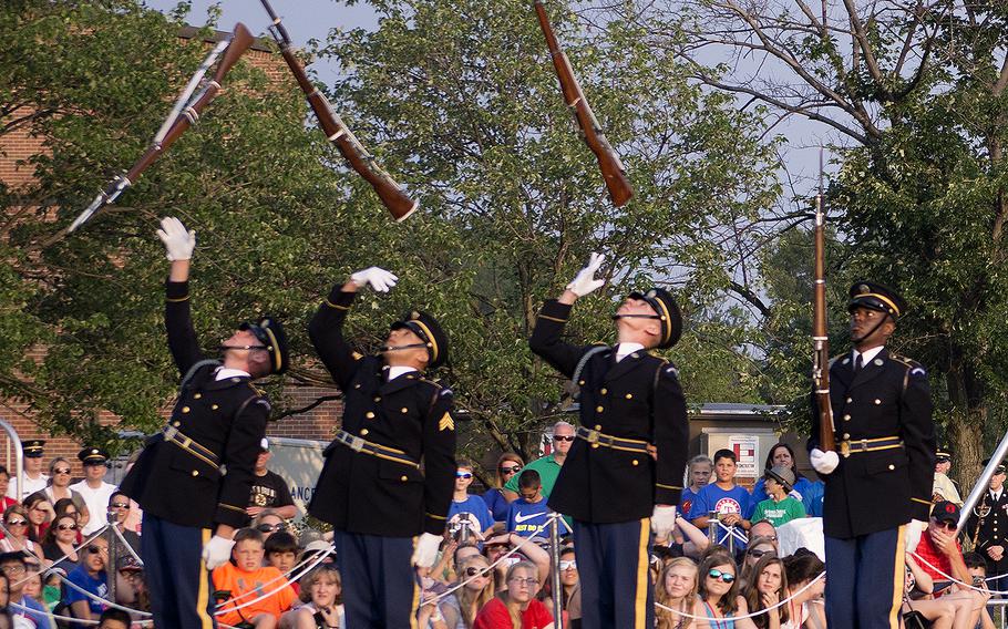 Soldiers at Joint Base Myer-Henderson Hall in Arlington, Va., on June 10, 2015, as part of the Twilight Tattoo, representing various eras of history.