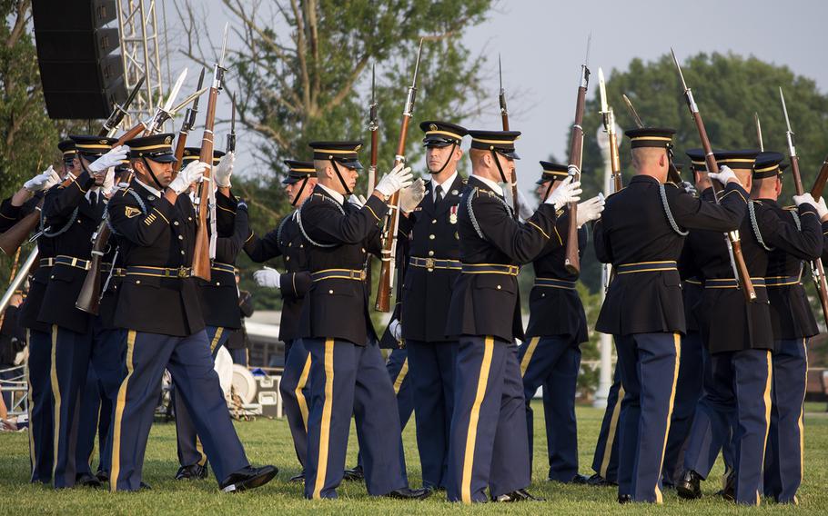 Soldiers at Joint Base Myer-Henderson Hall in Arlington, Va., on June 10, 2015, as part of the Twilight Tattoo, representing various eras of history.