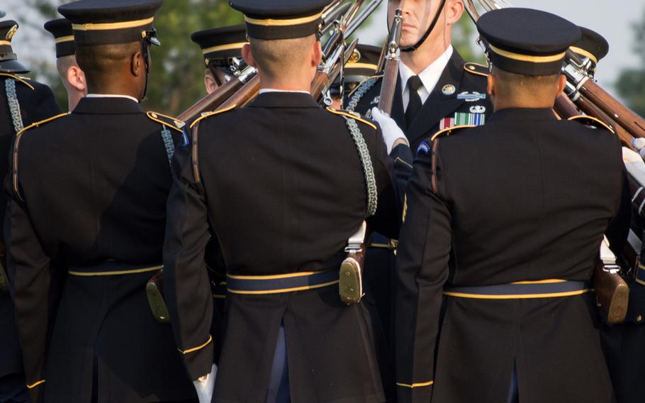 Soldiers with The Old Guard at Joint Base Myer-Henderson Hall in Arlington, Va., on June 10, 2015, as part of the Twilight Tattoo.