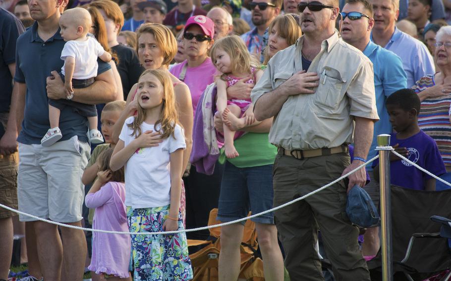 Visitors to Joint Base Myer-Henderson Hall at the Twilight Tattoo in Arlington, Va., on June 10, 2015. 