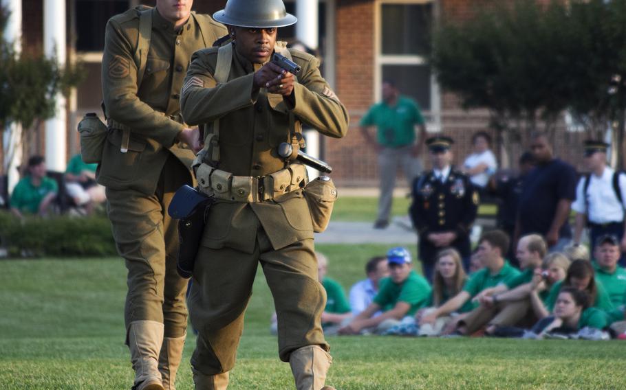 Soldiers dressed as World War I re-enactors march in front of spectators at Joint Base Myer- Henderson Hall in Arlington, Va., on June 10, 2015.