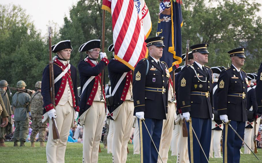 Soldiers at Joint Base Myer-Henderson Hall in Arlington, Va., on June 10, 2015, as part of the Twilight Tattoo, representing various eras of history. 
