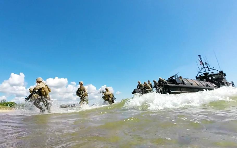 NATO Response Force and Allied Marines from the U.K., U.S., Sweden, and Finland simulate amphibious assaults on a Swedish beachhead during BALTOPS 2015, June 10. 