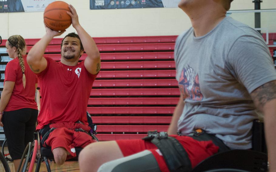 Wounded warriors Matt Greshen and Zachary Blair scrimmage on June 18, 2015, at Quantico the day before the opening ceremony for the Wounded Warrior Games.