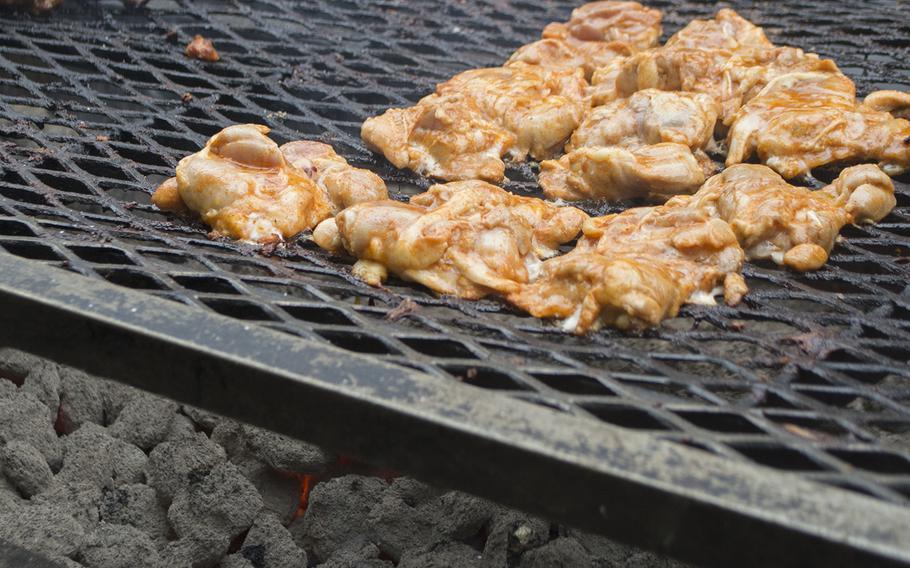The US Army's chicken sample cooks on the grill during the Military Chefs Cook-Off on June 27, 2015.