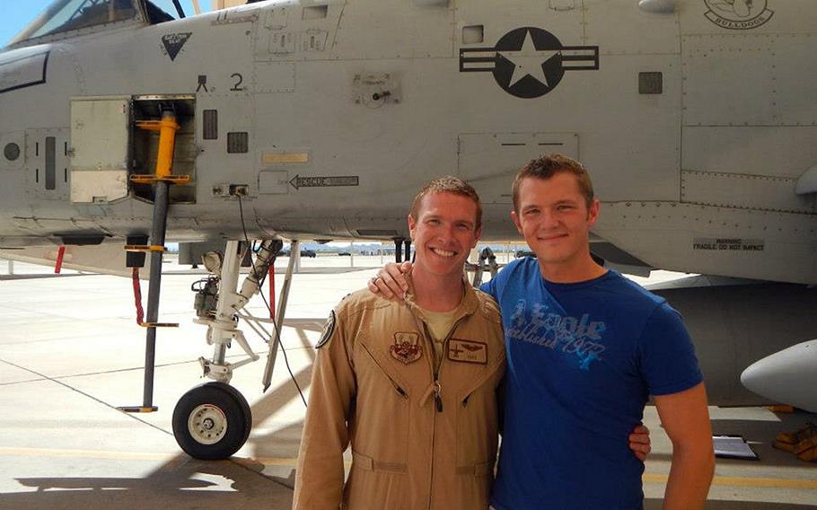 Former Air Force officer Tyler Haugseth, right, stands with his husband, Capt. Brent Cox. Haugseth, who lives with Cox in San Antonio, said the recent Supreme Court decision legalizing same-sex marriage across the U.S. was a win for gay servicemembers but left unanswered questions about adoption and parental rights.

