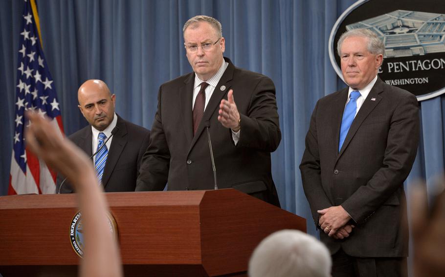 Deputy Secretary of Defense Bob Work, middle; Chairman of the Comprehensive Review Committee Dr. Vahid Majidi, left; and Under Secretary of Defense for Acquisition, Technology and Logistics Frank Kendall brief the media on the Defense Department's Comprehensive Anthrax Lab Review findings during a news conference at the Pentagon on Thursday, July 23, 2015.