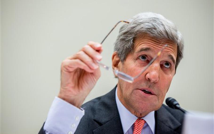 Secretary of State John Kerry testifies on Capitol Hill in Washington, Tuesday, July 28, 2015, before the House Foreign Affairs Committee hearing on the Iran Nuclear Agreement. Kerry pitched the administration's controversial nuclear deal with Iran to a skeptical House Foreign Affairs Committee on Tuesday, pushing back against the allegation it would ease crippling sanctions forever in exchange for temporary concessions on weapons development.