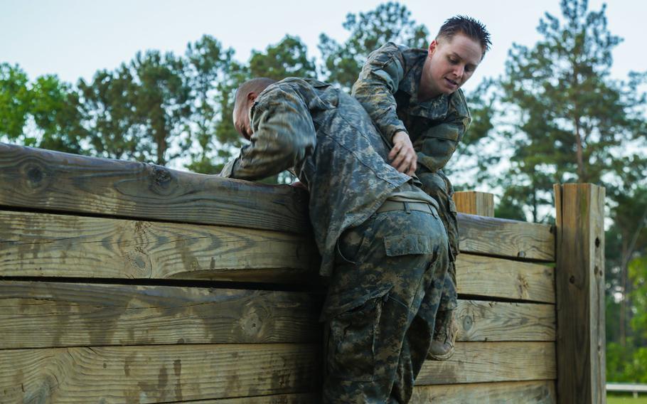 Soldiers display teamwork during the Ranger Course on Fort Benning, Ga., on April 21, 2015.