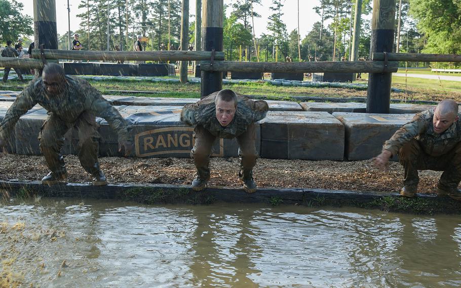 Soldiers attend the Ranger Course to learn additional leadership and small unit technical and tactical skills in a physically and mentally demanding, combat simulated environment. This scene from the course was taken on April 21, 2015.