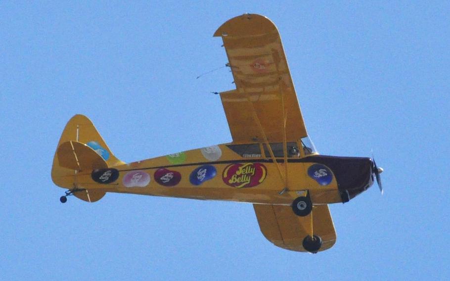 Kent Pietsch flies the "Jelly Belly" plane over spectators at the 2015 Joint Base Andrews Air Show. The show attracted over 10,000 attendees after a three-year hiatus. 