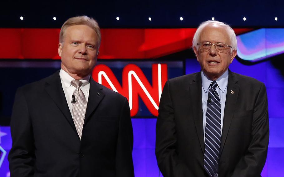 Democratic presidential candidates Jim Webb, left, and Bernie Sanders on the debate stage on Tuesday, Oct. 13, 2015, in Las Vegas.