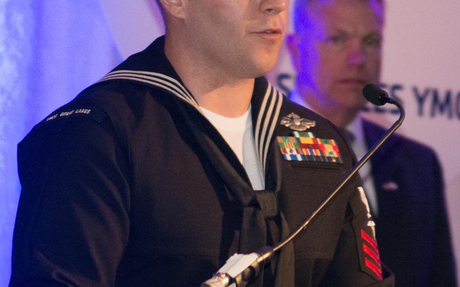 U.S. Navy Petty Officer First Class Joshua Van Horn takes the stage at the Angels of the Battlefield gala on Nov. 4, 2015, in Washington, D.C.