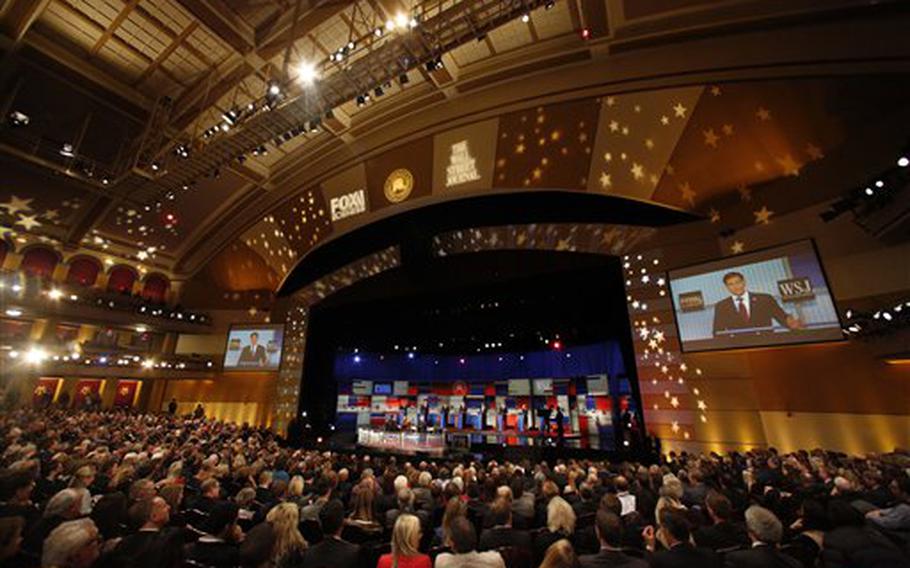 Republican presidential candidates John Kasich, Jeb Bush, Marco Rubio, Donald Trump, Ben Carson, Ted Cruz, Carly Fiorina and Rand Paul appear during the Republican presidential debate at the Milwaukee Theatre, Tuesday, Nov. 10, 2015, in Milwaukee.