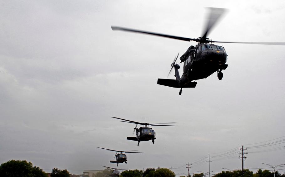 U.S. Army officials confirmed the deaths of four Black Hawk crewmembers following a crash at a Fort Hood range Monday, Nov. 23, 2015. Here, four Fort Hood-based Black Hawk helicopters belonging to the 1st Air Cavalry Brigade, 1st Cavalry Division leave an air field at the installation during a training exercise in August. 