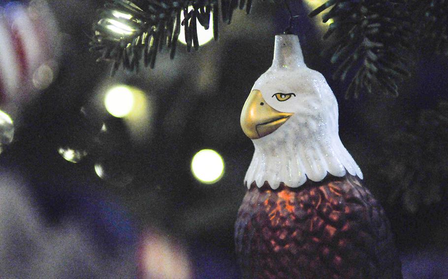 Bald eagle ornaments adorn a Christmas tree that pays tribute to military troops at the White House on Dec. 2, 2015. The tree is also adorned with gold star ornaments inscribed with the names of fallen troops.