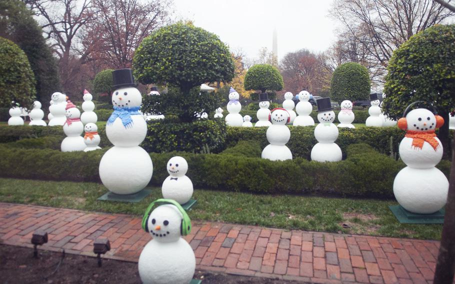 Fifty-six snowmen adorn the grounds of the White House, representing the 56 states and territories. First Lady Michelle Obama hosted a preview of holiday decorations for military families on Dec. 2, 2015.
