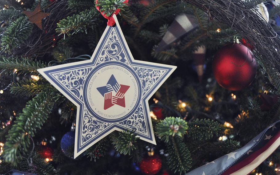 A star with a Joining Forces logo adorns a military-themed Christmas tree at the Vice President's residence in Washington, D.C. on Dec. 8, 2015. Joining Forces is a national campaign launched by Second Lady Jill Biden and First Lady Michelle Obama to support military troops and veterans.