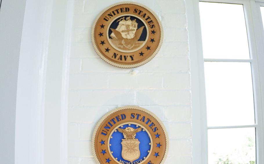 The seals of the military branches adorn the sunroom of the Vice President's residence on Dec. 8, 2015. Also in the room is a military-themed Christmas tree.