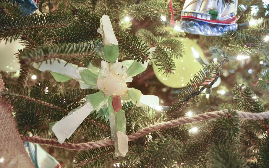 A hand-crafted sea glass ornament made by a military child at Kadena Air Base in Okinawa, Japan, adorns a Christmas tree at the Vice President's residence on Dec. 8, 2015. Second Lady Jill Biden visited the children earlier in the year.