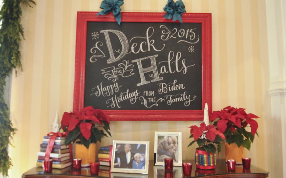 A holiday greeting hangs in the foyer of the Vice President's residence on Dec. 8, 2015.
