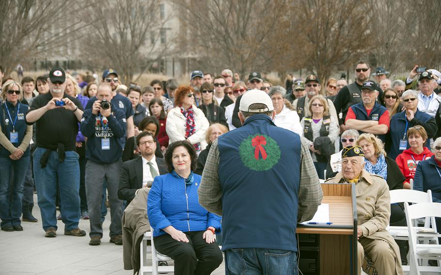 Morrill Worcester, founder of Wreaths Across America, addresses a crowd of onlookers during the annual wreath-hanging ceremony at the Pentagon in Arlington, Va., on Friday, Dec. 11, 2015. The wreaths honored the 184 victims who died on Sept. 11, 2001, when a hijacked aircraft was crashed into the side of the Pentagon.