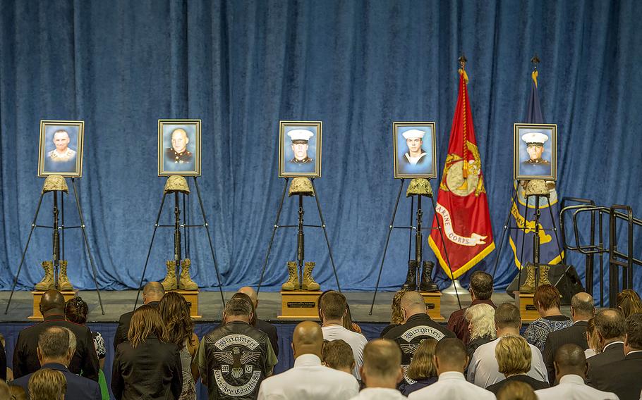 Family and friends of the U.S. sailor and four Marines killed July 16 in Chattanooga, Tenn., attend a memorial service in Chattanooga, on Aug. 15, 2015. The Navy on Wednesday, Dec. 16, 2015, announced it would award Purple Hearts to the slain servicemembers after the FBI called the shooting a terror attack.