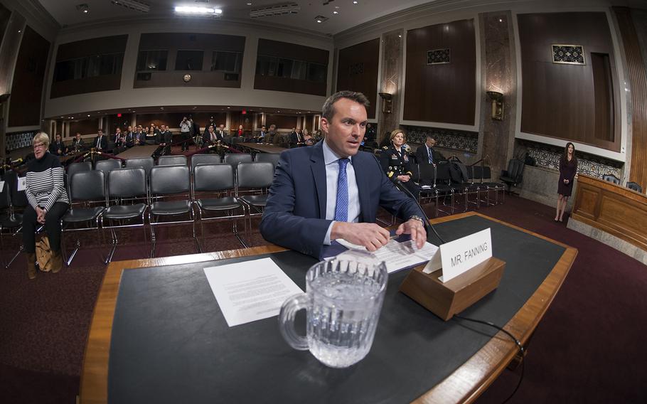 Eric Fanning takes a seat at the witness table just before the start of a Senate Committee on Armed Services hearing Thursday, Jan. 21, 2016, on Capitol Hill in Washington, D.C., as committee members considered his nomination to become the next secretary of the Army.