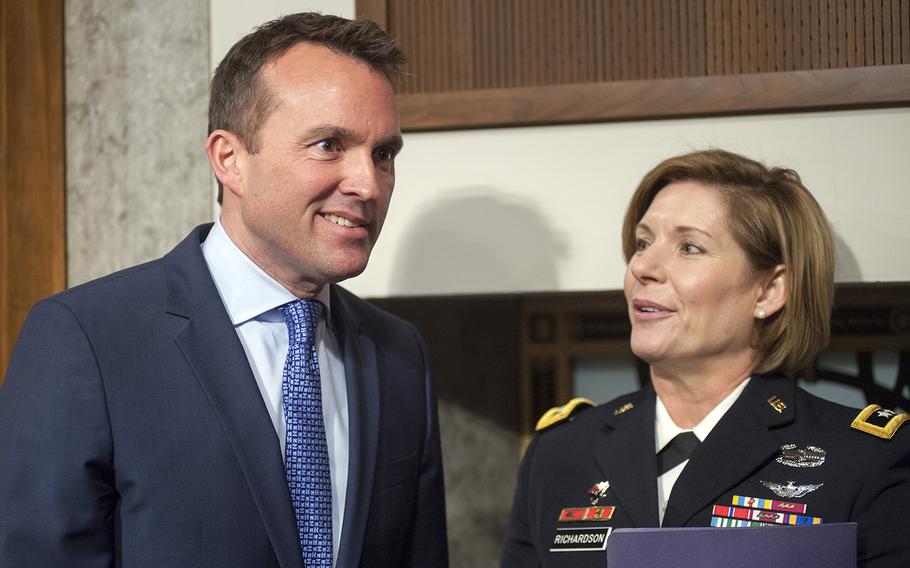 Eric Fanning confers with Maj. Gen. Laura Richardson before the start of a Senate Committee on Armed Services hearing Thursday, Jan. 21, 2016, on Capitol Hill in Washington, D.C., where committee members considered Fanning's nomination to become the next secretary of the Army.