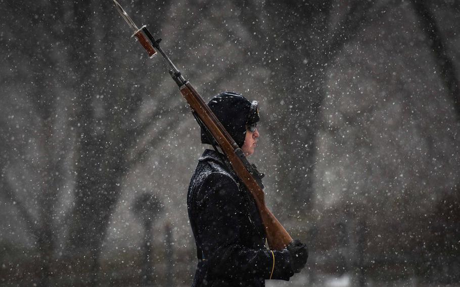‪US Army‬ Sentinels, assigned to the 3d U.S. Infantry Regiment (The Old Guard), stand guard at the Tomb of the Unknown Soldier at Arlington National Cemetery, Va., Jan. 22, 2016, as a record breaking snow storm hits the Washington, D.C. area. The Tomb Guards maintain a constant vigil at the Tomb no matter the weather conditions.