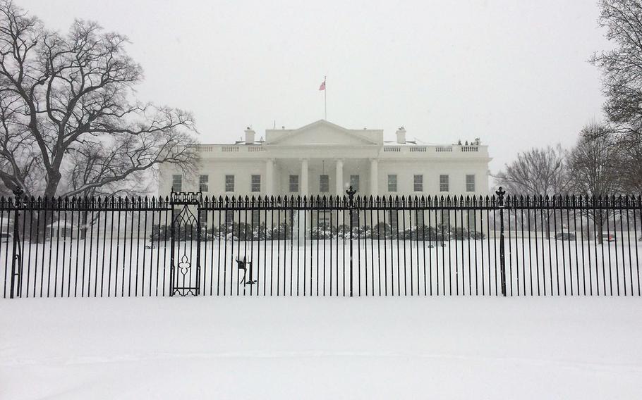 White House and white surroundings during a snowstorm in Washington, D.C., Saturday, Jan. 23, 2016.