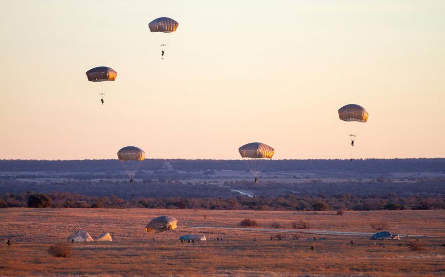 Fort Bragg, N.C., Soldiers of 1st Brigade Combat Team, 82nd Airborne Division, land on Fort Hood's Antelope Drop Zone as a part of the Global Response Force emergency deployment readiness exercise here just after sunrise Feb. 9. The exercise brought more than 800 troopers and heavy equipment to Fort Hood. 
