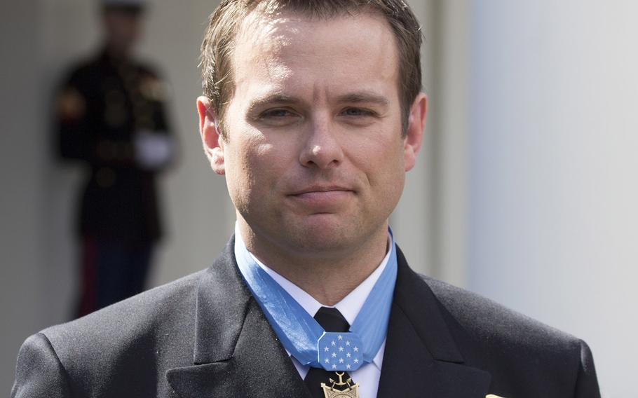 Senior Chief Petty Officer Edward C. Byers Jr. talks to reporters after receiving the Medal of Honor at a White House ceremony, Feb. 29, 2016.