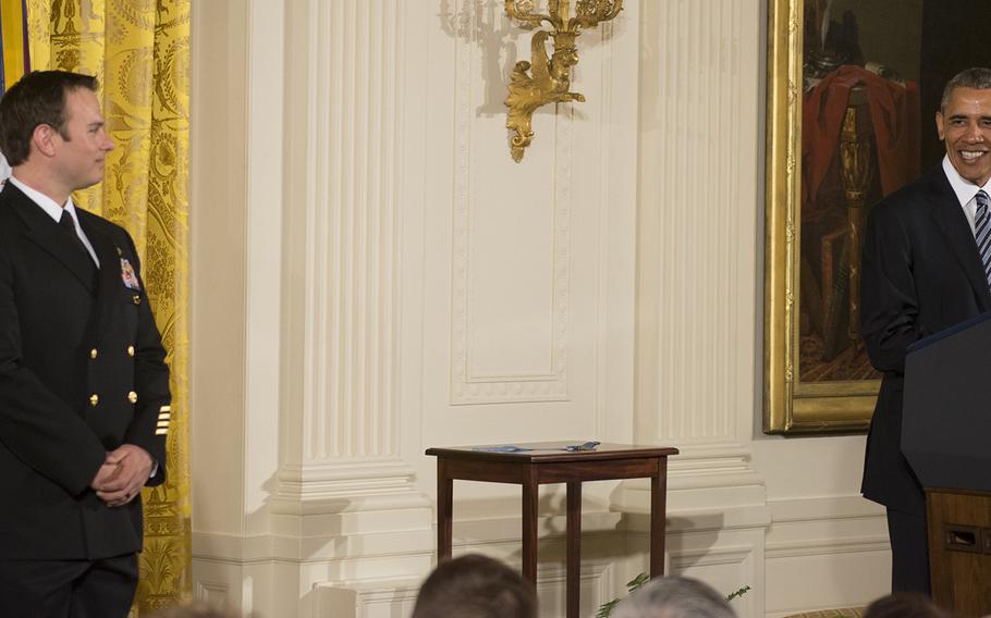 Senior Chief Petty Officer Edward C. Byers Jr.  awaits the Medal of Honor from President Barack Obama on Feb. 29, 2016. 