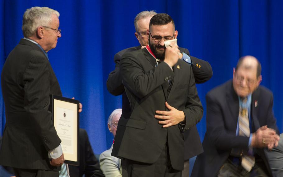 Chris Mintz gets emotional as he receives a 2016 Citizen Honors Award on National Medal of Honor Day on March 25, 2016.